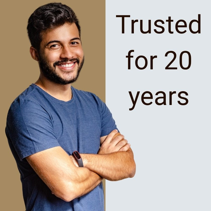 Man with arms crossed on a beige background with text 'Trusted for 20 years'.